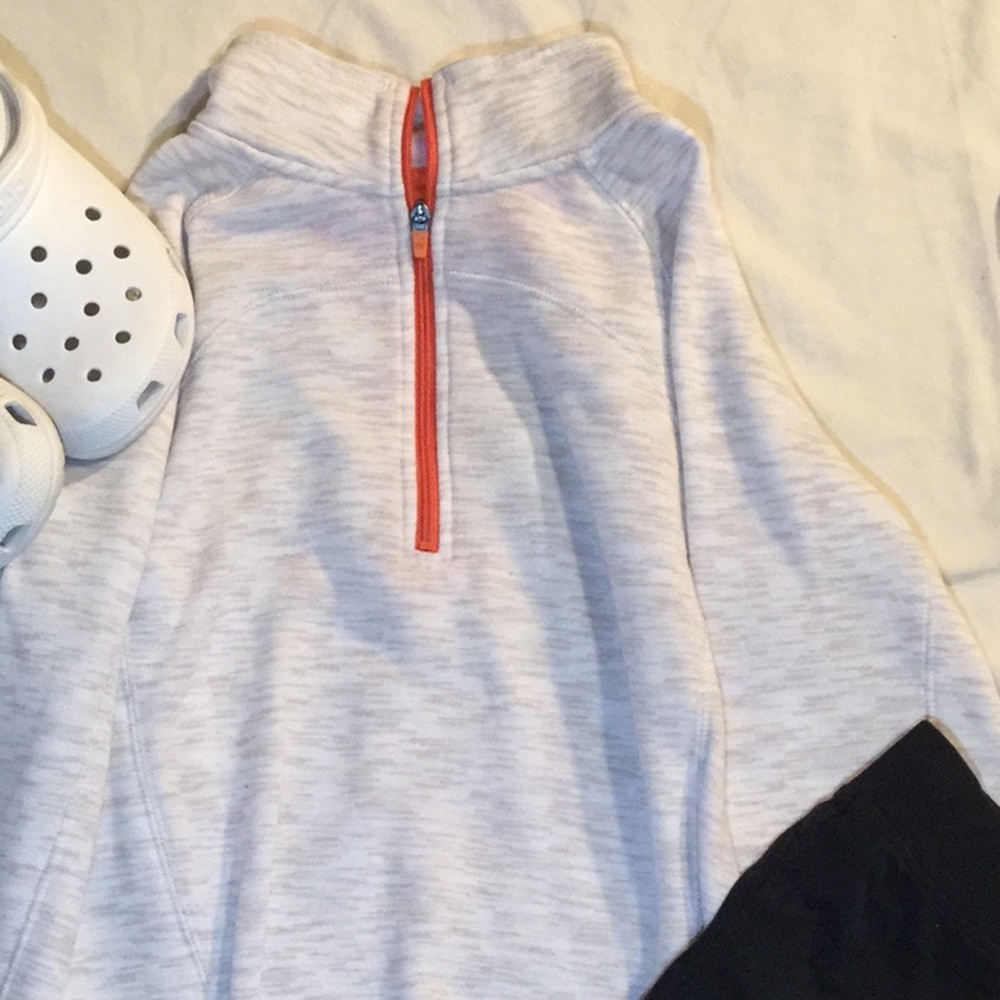 Orange and white zip up